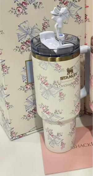 Stanley x LoveShackFancy 40oz Quencher H2.0 Tumbler with vintage floral design and ergonomic handle