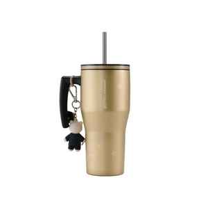 Starbucks x Harry Potter Golden Hogwarts Castle thermal mug 30oz with metallic gold finish and ergonomic black handle