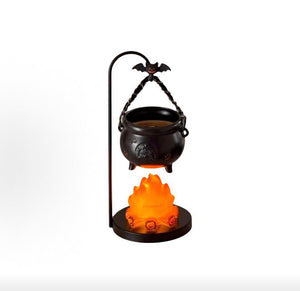 Halloween cauldron lamp with black metal stand and flame base