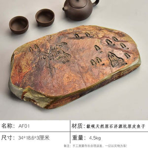 Handcrafted natural stone tea tray with traditional carvings for Gongfu tea ceremony