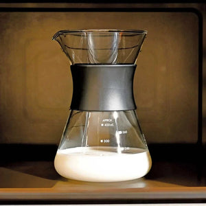 HARIO V60 Drip Decanter 400ml with removable smoke-grey dripper and black silicone band for minimalist coffee brewing