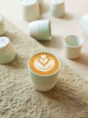 Modern handleless ceramic Loveramics espresso cup with dual-texture finish and pastel color