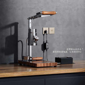 Aleman 2s hand press coffee machine with stainless steel body and wooden base for semi-automatic espresso brewing