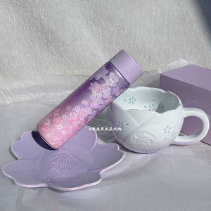 Starbucks cup from Purple Cherry Blossom Collection with floral design and stainless steel drinkware