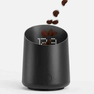 Black subminimum digital coffee scale with LED display, touch control, and rechargeable USB-C for precise coffee measurement