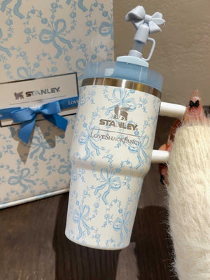 Stanley x Winnie the Pooh Hundred Acre Wood Edition tumbler with vintage Pooh illustrations and gold accents