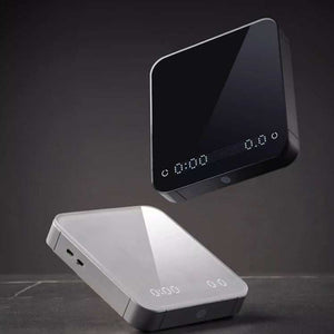 HARIO Smart Electronic Scale with dual LED display, polished glass surface, and rechargeable battery for precise coffee brewing