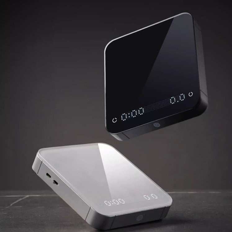 HARIO Smart Electronic Scale with dual LED display, polished glass surface, and rechargeable battery for precise coffee brewing