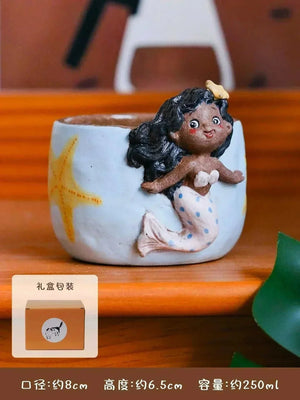 Hand-sculpted ceramic coffee cup from Yifang Coffee Cup Artisan Series with whimsical 3D details and textured finish