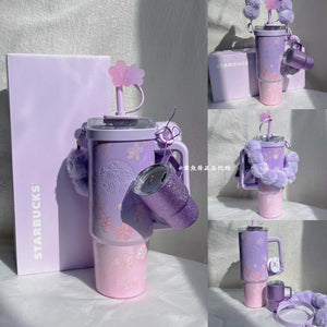 Starbucks cup from Purple Cherry Blossom Collection stainless steel drinkware with floral design and vacuum insulation