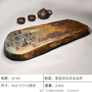 Handcrafted natural stone tea tray with intricate carvings for Gongfu tea ceremony