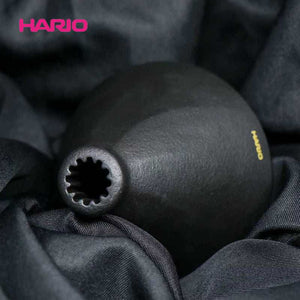 HARIO V60 Alpha immersion smart filter cup in matte black ceramic with gold logo and valve switch for hybrid coffee brewing