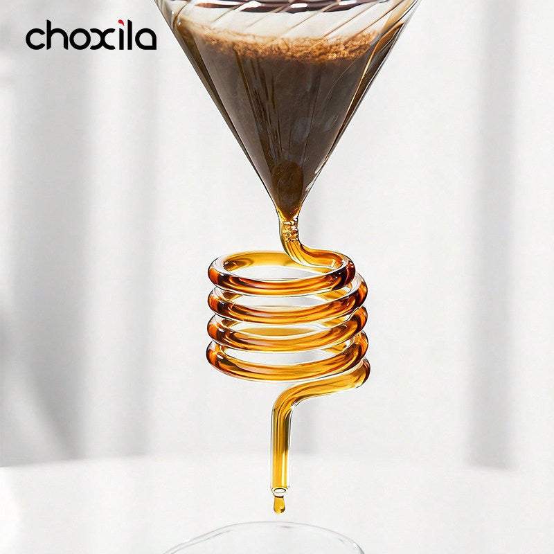 Choxila Snake Tube glass coffee dripper with amber spiral tube on wooden base and matte black metal stand for slow-drip pour-over brewing