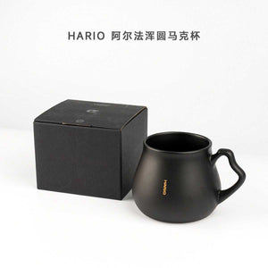 HARIO V60 Alpha Immersion Smart Filter Cup No. 02 matte black ceramic coffee brewer with gold logo and ergonomic handle