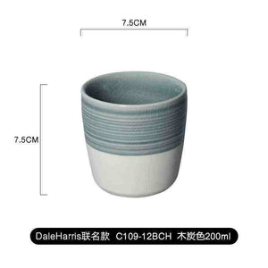Modern handleless ceramic coffee tumbler with dual-texture finish for espresso and lattes loveramics