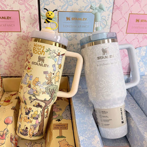 Stanley x Winnie the Pooh tumbler with Hundred Acre Wood artwork and gold accents in gift set