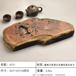 Handcrafted natural stone tea tray with traditional carvings for Gongfu tea ceremony