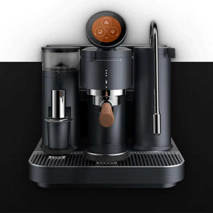 Meraki All-In-One Espresso Machine in matte black with walnut handle and smart touch circular display on kitchen countertop