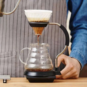 HARIO V60 Set glass dripper with stainless steel stand and spiral carafe on black non-slip base