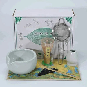 Cup To Machine Matcha tea set with spouted ceramic bowl, bamboo whisk, scoop, whisk holder, and stainless steel sifter for traditional Maccha preparation