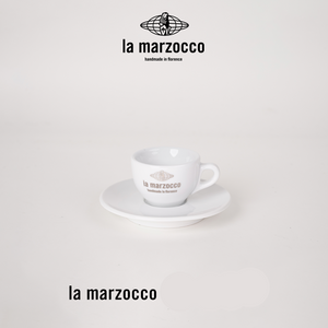 La Marzocco Heritage ceramic coffee cup and saucer set showcasing sleek Italian design and high-quality craftsmanship