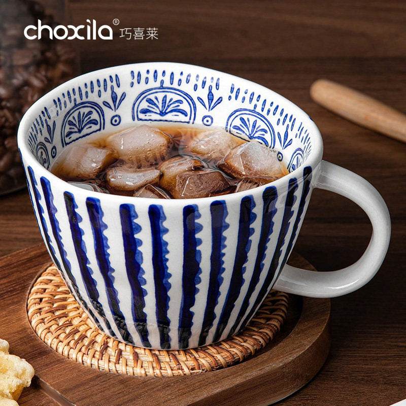 Choxila Hand-Painted Mug with blue and white ceramic design and ergonomic handle