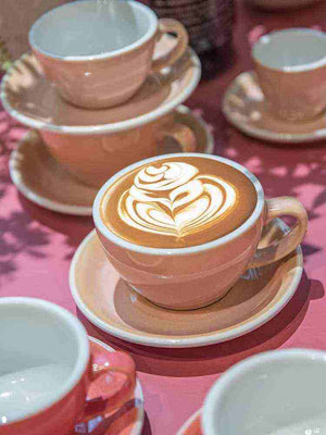 Loveramics Etoile Edition egg-shaped ceramic coffee set with floral design and matching saucer