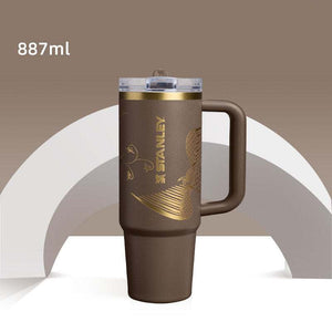 Stanley x NEST limited edition insulated travel bottles with artistic designs and dual-wall vacuum insulation