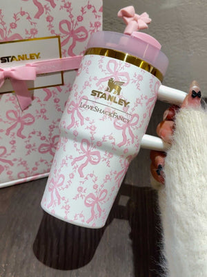 Stanley x Winnie the Pooh Hundred Acre Wood tumbler with classic characters and gold accents