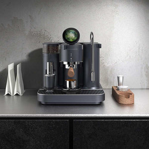 Meraki All-In-One Espresso Machine with integrated grinder, smart touch display, and walnut handle in matte black finish