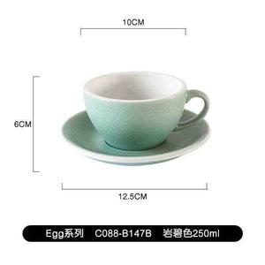 Loveramics Etoile Edition egg-shaped ceramic coffee cup with floral design and matching saucer