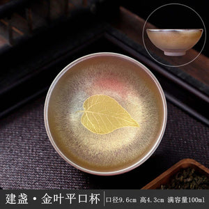 Chinese master cup in handmade ceramic with a gold leaf finish