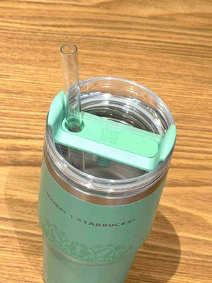 Starbucks x Stanley Emerald Green insulated stainless steel travel mug with matte finish and clear straw