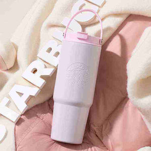 Starbucks Pink Summer Collection cups with ergonomic handles, pastel designs, and braided straps for eco-friendly, stylish cold drinks