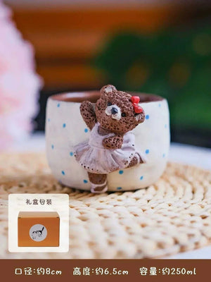 Hand-sculpted ceramic coffee cup from Yifang Coffee Cup Artisan Series with whimsical 3D details and textured finish
