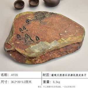Handcrafted natural stone tea tray She Yan Gongfu tea board with carved traditional motifs and ochre mineral texture