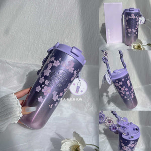 Starbucks cup from Purple Cherry Blossom Collection stainless steel drinkware with floral design and vacuum insulation