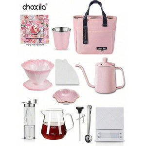 Blush Pink Travel Set with ceramic dripper, gooseneck kettle, marble manual grinder, insulated steel mug, glass server, and pink carrying case for portable coffee brewing