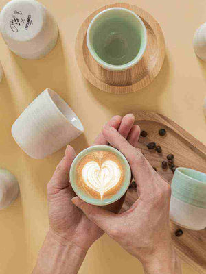 Handleless modern ceramic espresso cup Loveramics with dual-texture finish in pastel colors
