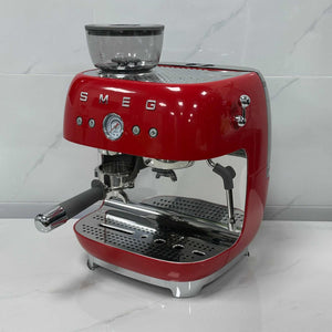 SMEG Espresso Coffee Machine with built-in grinder, 20 bar pressure, milk frother, and premium metal design