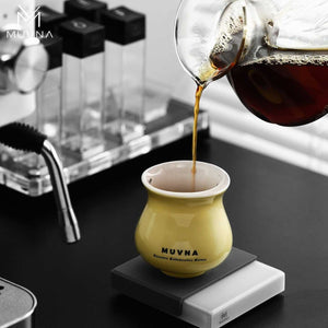 MUVNA Professional Coffee Tasting Cup with asymmetrical rim and premium ceramic design for enhanced coffee aroma and flavor profiles