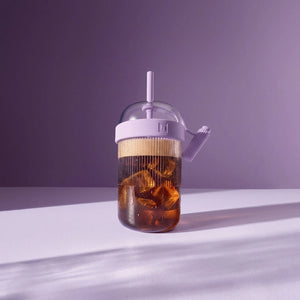 Iced coffee shaker cup in lavender purple with iced coffee inside