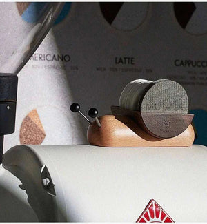 MUVNA Magnetic Tamper Wall Mount holding espresso tamper vertically on wood shelf for space-saving organization