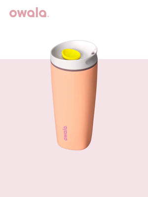 Owala insulated coffee mug in peach with yellow lid button, front view