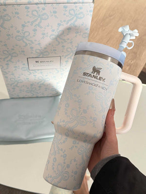 Stanley x Winnie the Pooh Hundred Acre Wood edition tumbler with classic Pooh characters and gold accents