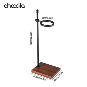 Choxila Snake Tube glass coffee dripper with amber spiral tube on wooden base and black metal stand for slow pour-over brewing