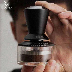 MUVNA Magnetic Dosing Funnel securely attached to 58mm portafilter with magnetic wall mount for espresso brewing precision