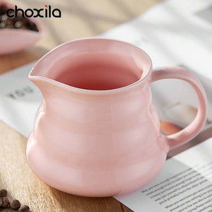Choxila Origami Series soft pink ceramic coffee dripper and server set on natural bamboo tray with geometric design