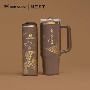 Stanley x NEST limited edition insulated travel bottles with artistic designs and cultural motifs