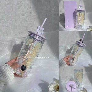 Starbucks cup from Purple Cherry Blossom Collection stainless steel drinkware with floral design and vacuum insulation
